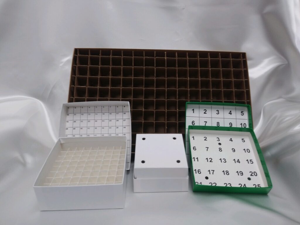 four different pharmaceutical boxes in different shapes and sizes